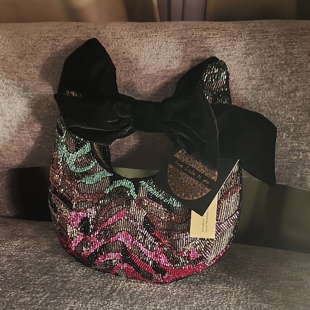 Elegant Multicolor Sequin Clutch with Black Bow